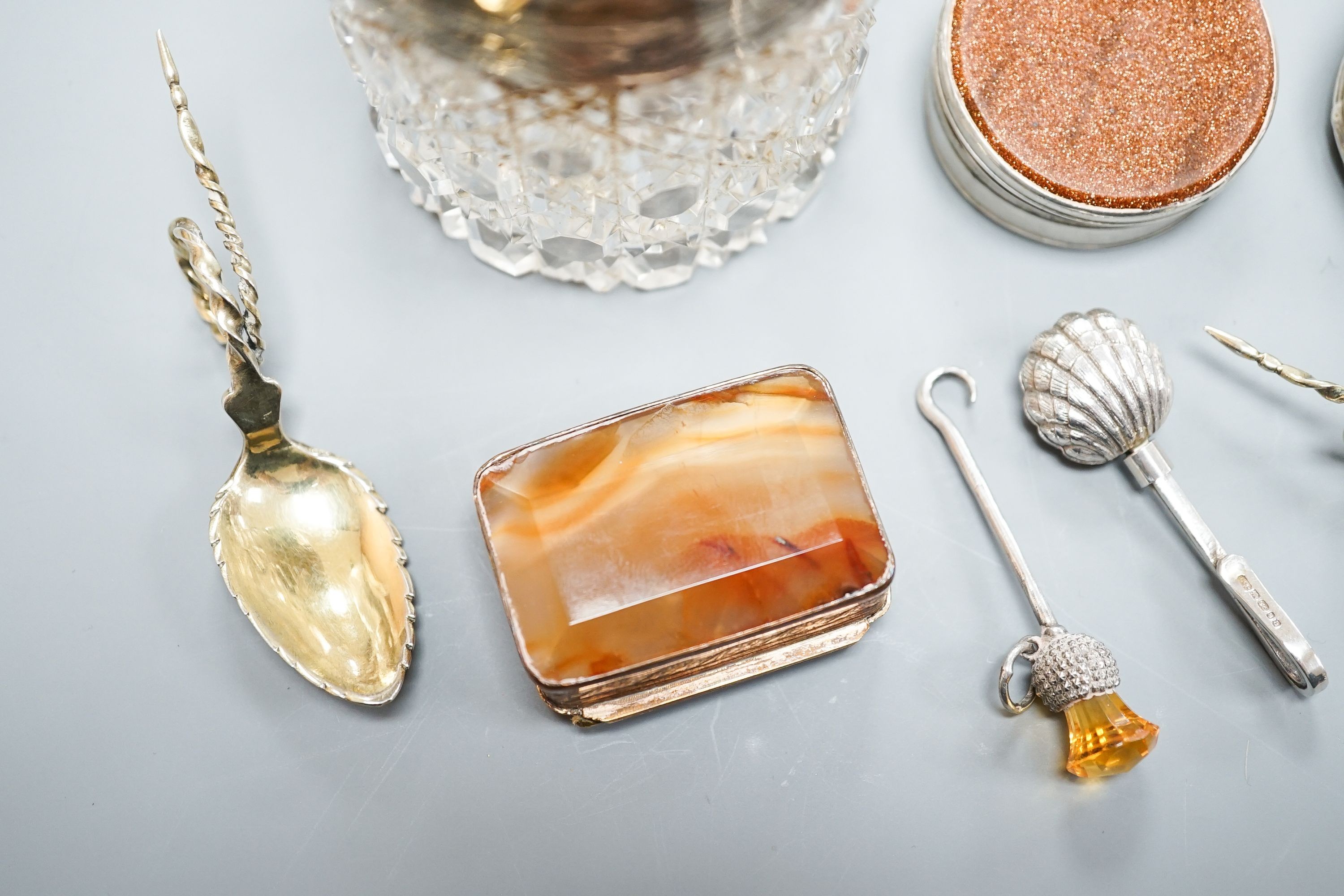 A mid 18th century counter box (adapted?), 4cm, a George V silver pill box, a banded agate set copper snuff box, two small gilt white metal spoons stamped '131/2', a George V silver button hook with thistle terminal and